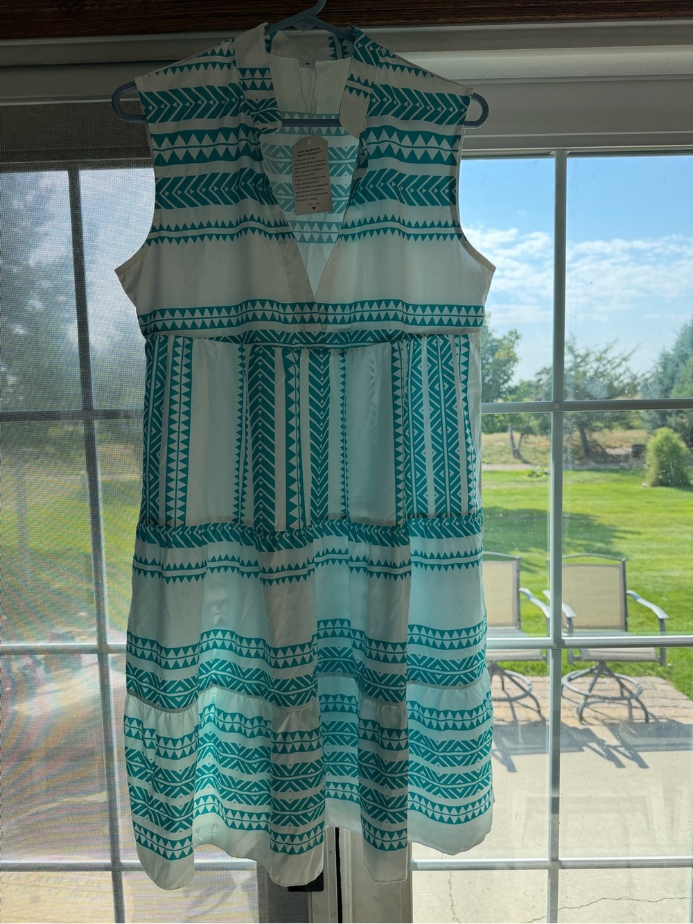 Sleeveless White and Teal Patterned Summer Dress. Bin 115.